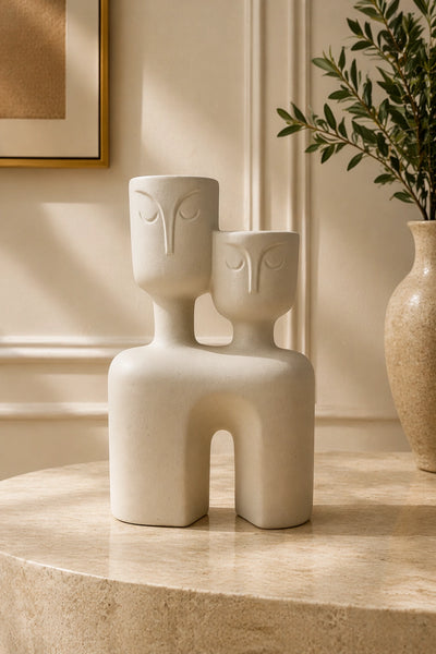 Elunne's whisperstone- vase and sculpture