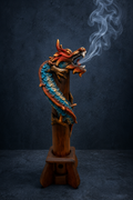 The Imperial Whisper blue dragon incense holder by Elunne — front view
